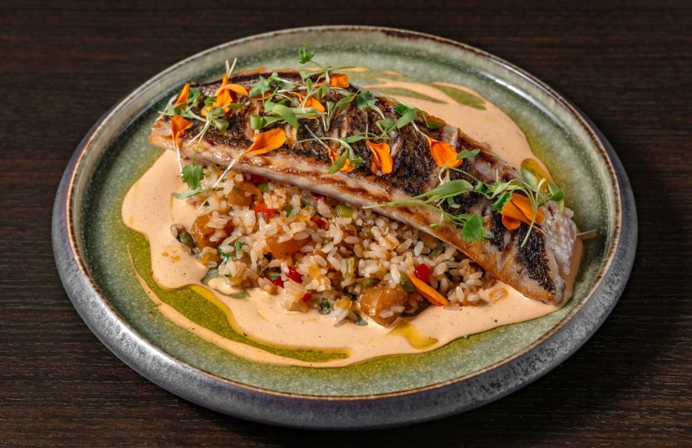 Red Snapper, Island Rice with Pineapple, Peppers, Coconut, Achiote-Lime Sauce, Pepitas