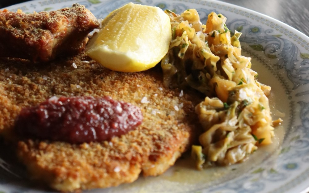 Cast Iron Fried Green Circle Chicken, Fried Egg, Heirloom Tomato, Salsa Verde, Boquerones