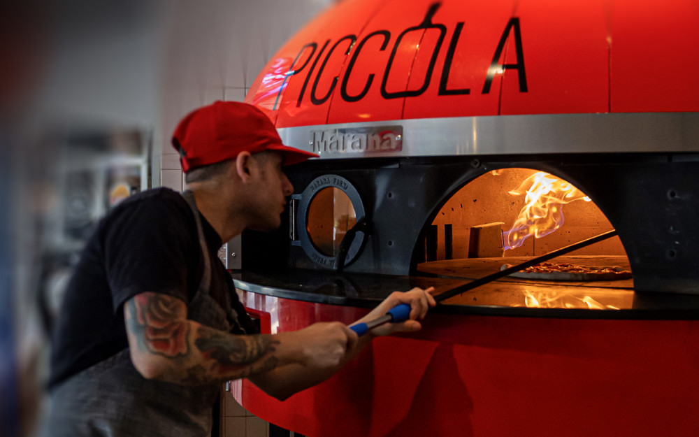 Our pizzaiolos from Naples, Italy, craft every pizza with authentic tradition, passion, and time-honored techniques.