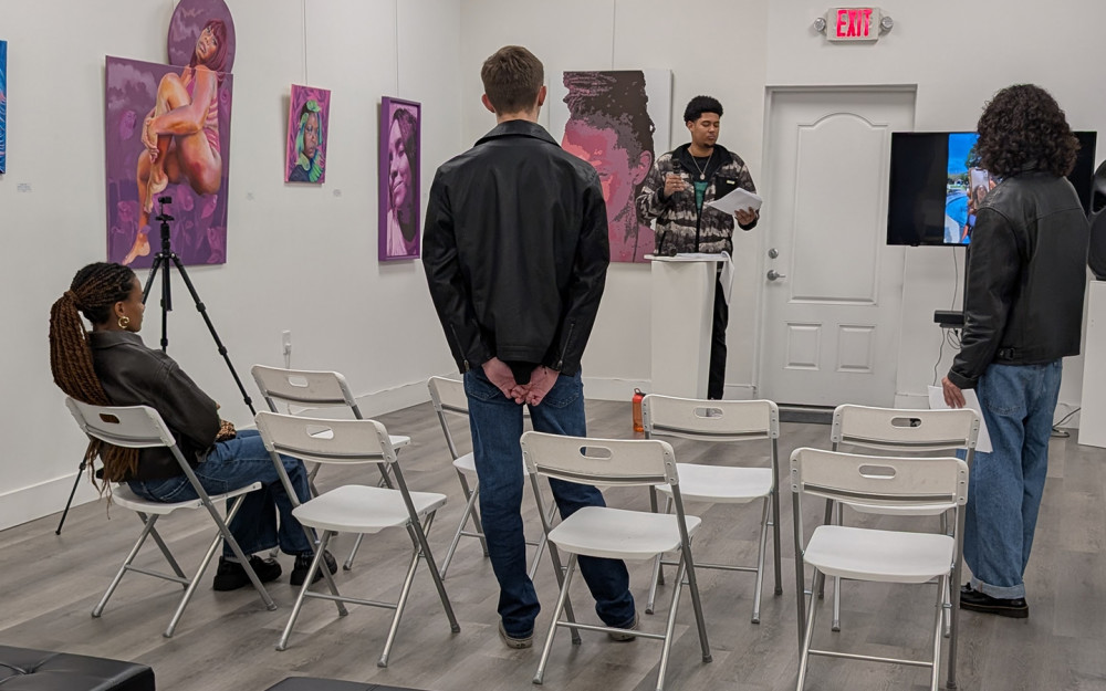 Rehearsing for a poetry night at the gallery