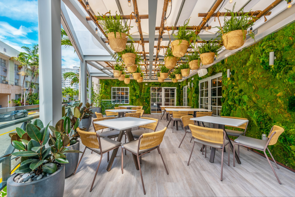 Restaurant's Outdoor Terrace Overlooking the Action of Collins Avenue