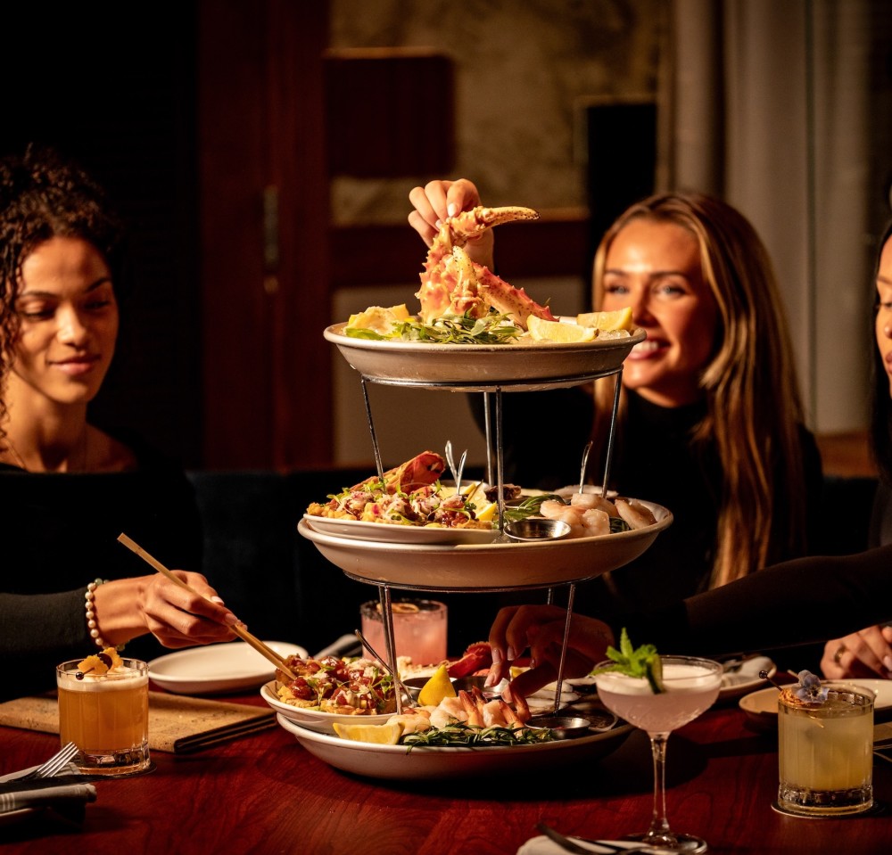 Share our signature seafood tower with East Coast oysters, lobster tail, shrimp and crispy tuna roll. Serves two or four.