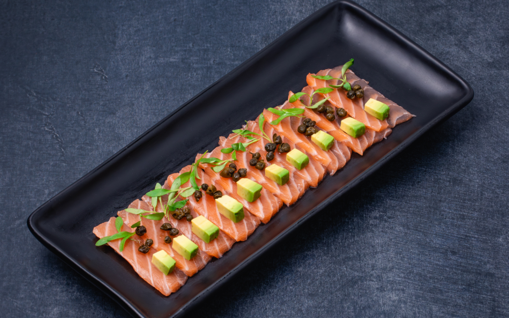 Faroe Islands Salmon Sashimi: avocado, crispy capers, micro cilantro, chipotle-ponzu