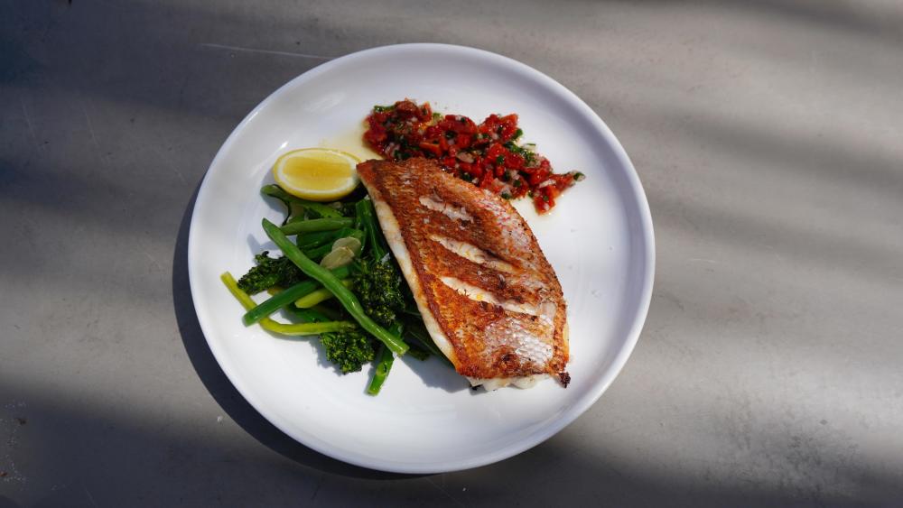 Seared Local Red Snapper
 asparagus, green beans, sun dried tomato vinaigrette