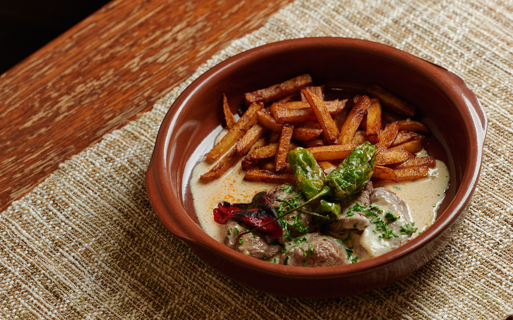 Bistro with Blue Cheese Sauce - Shishito peppers, piquillo confit, and french fries.