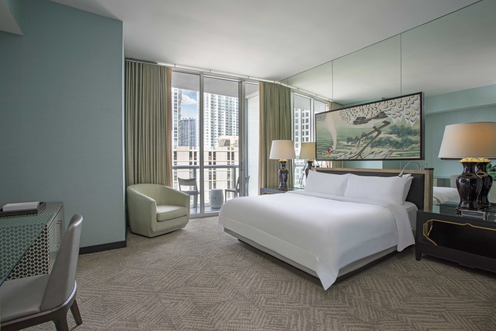 Stay regal in 480 square feet of luxury with your floor-to-ceiling marble bathroom, a private balcony overlooking the city and more.