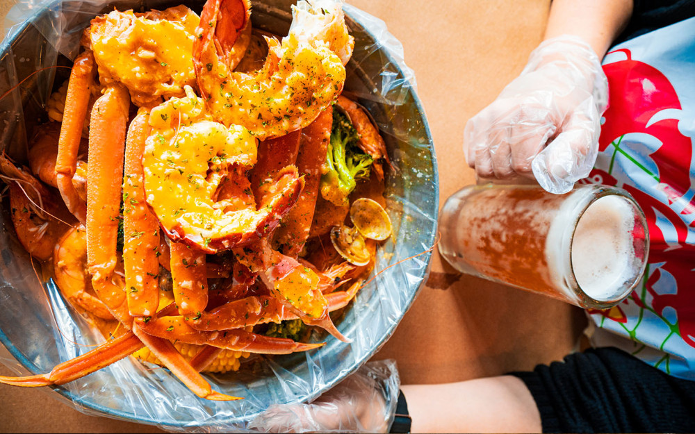 Seafood boil combo and beer.