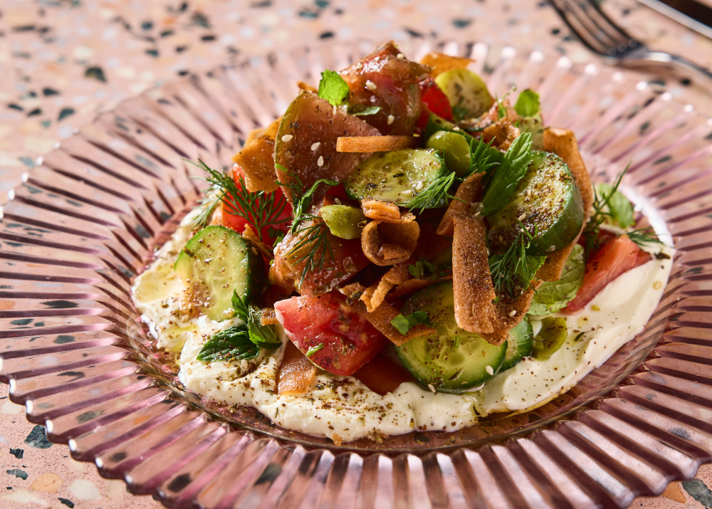 tomatoes, cucumbers, ripped pita, pomergranate molasses