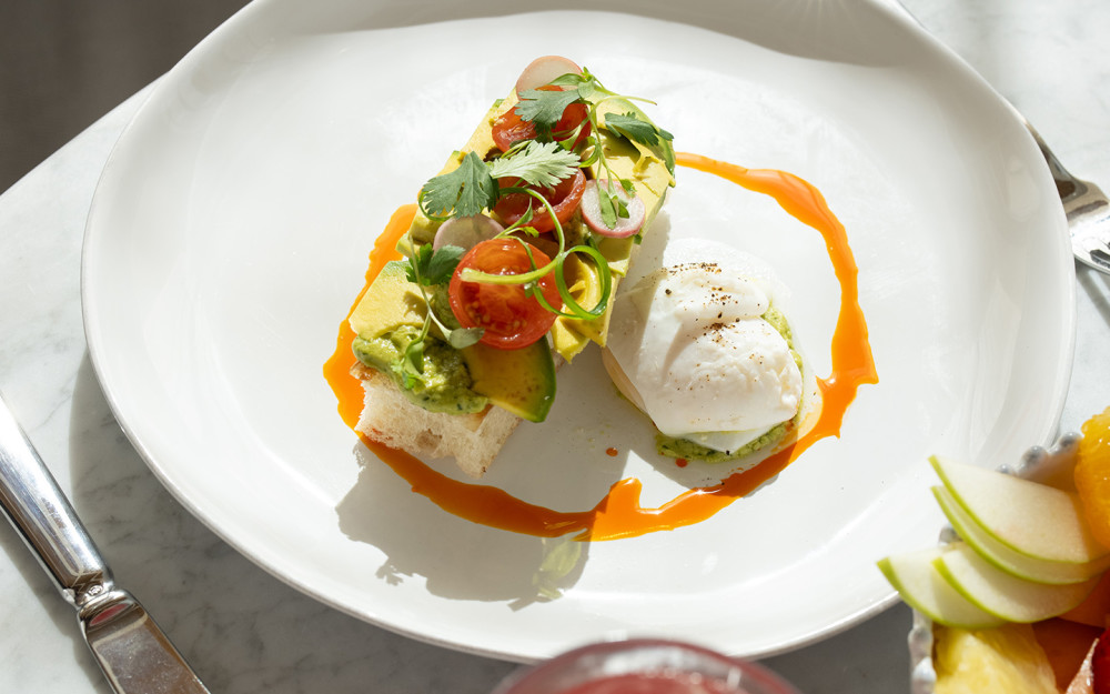 Riviera appetizer with fresh Burrata served with Tomato, Marcona Almonds and Olive Oil.