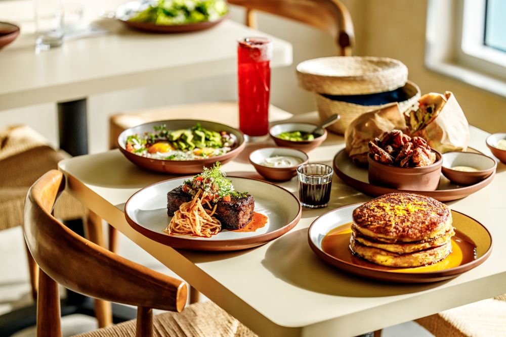 Brunch Tableside: Huevos Rancheros + Pork Carnitas + Fish Milanesa Torta + Corn Masa Pancakes