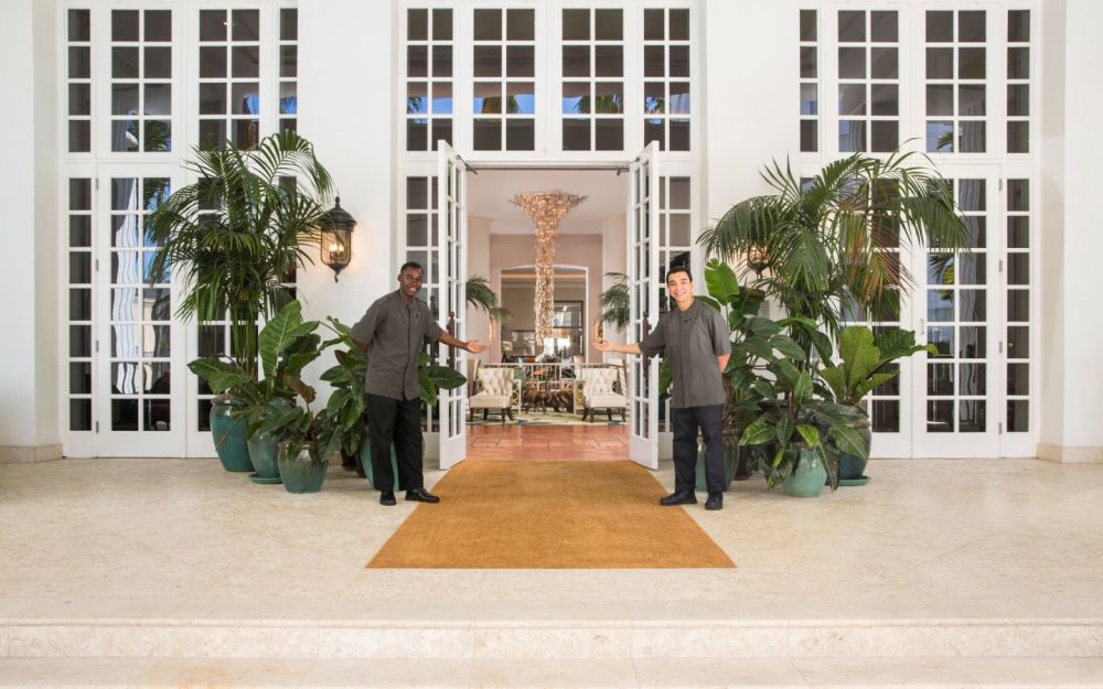 Bellmen welcoming guest