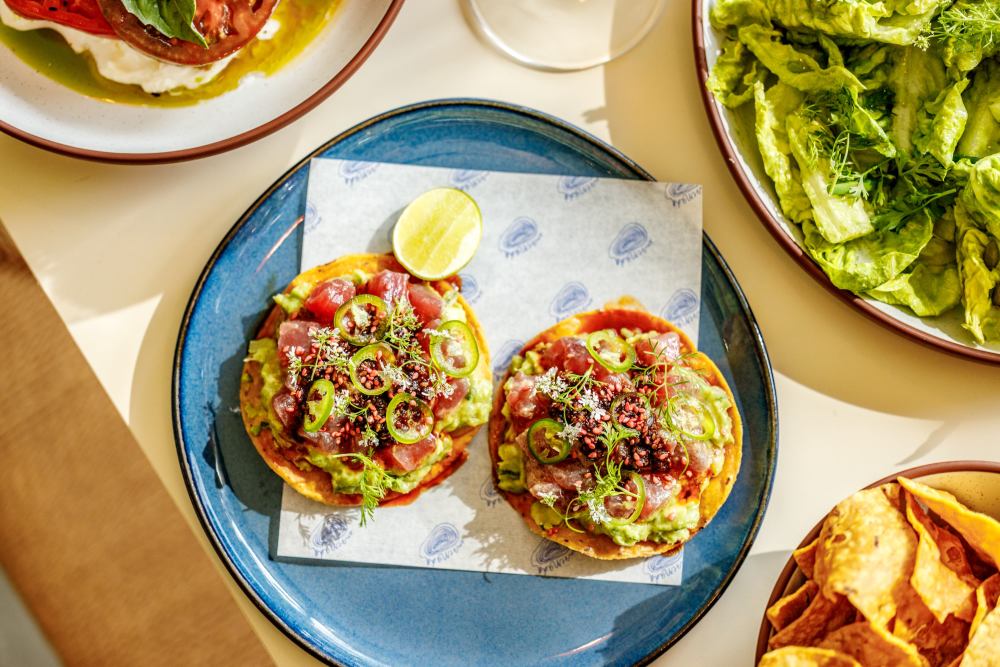 yellow fin, guacamole, plum sesame seeds and salsa macha