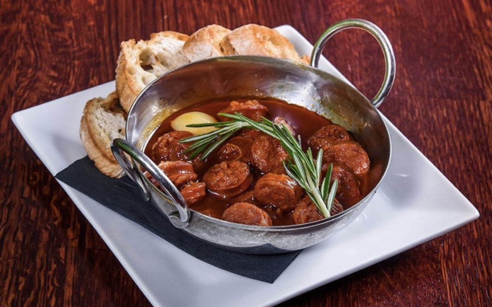 Chorizo al Vino: Spanish chorizo and potatoes braised in red wine.
