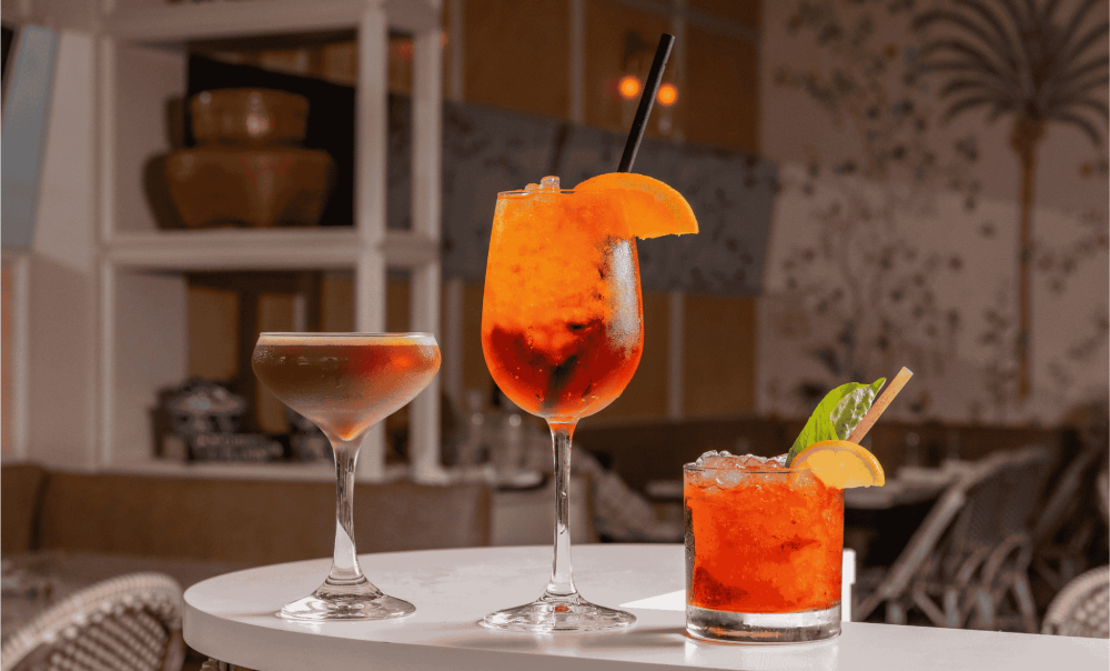 Kick off happy hour with a creamy cocktail, citrusy spritz, or minty refresher—three bold sips made for golden hour in Miami.