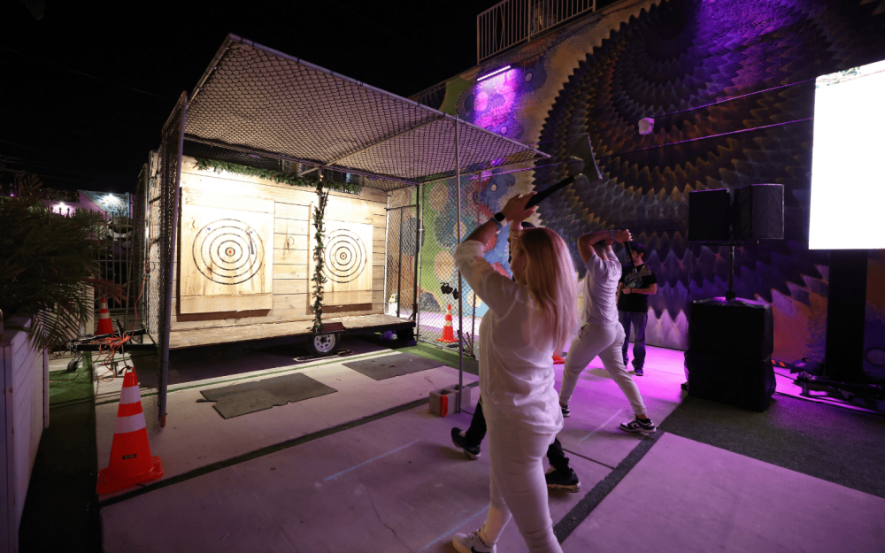 Unleash your inner warrior with Axe Throwing at FunDimension! Aim, throw, and compete in an adrenaline-pumping experience perfect for thrill-seekers!