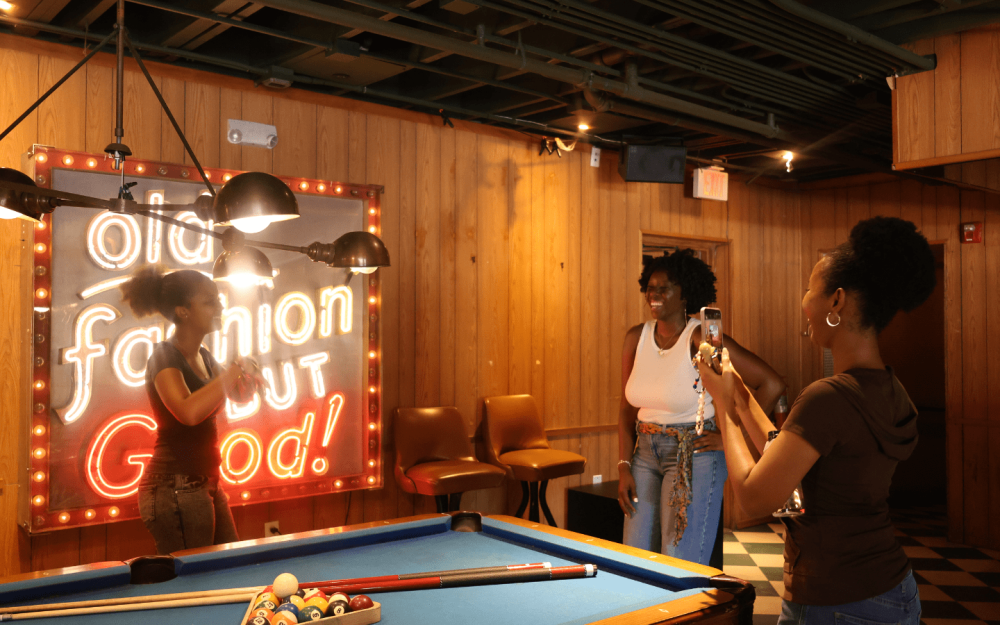 Guests enjoy a stop on Key2MIA’s Melanin Miami tour, an immersive experience exploring Miami’s Black history, culture, neighborhoods, and local busine
