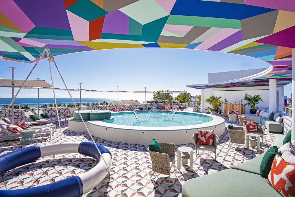 Cool off in the shallow lounging pool with chaises submerged in the water and daybeds shaped like lily pads; perch on the communal swing shaped like a giant life preserver; or gather around daybeds, sofas, and lounge chairs.