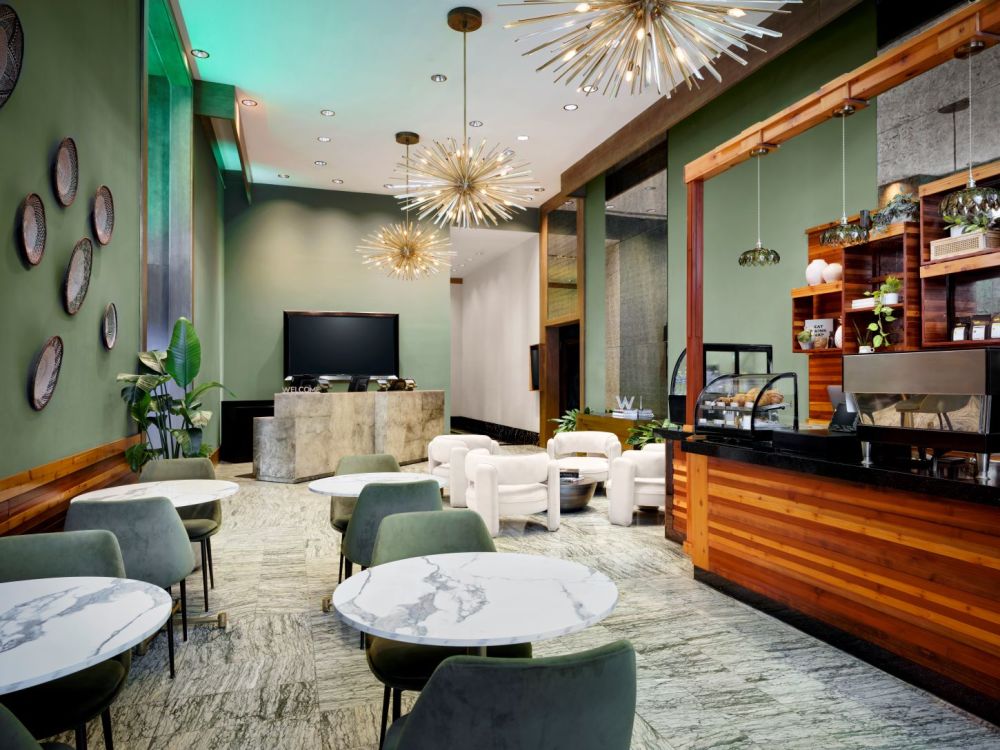 Step into our Living Room lobby where sophistication meets effortless Miami style.