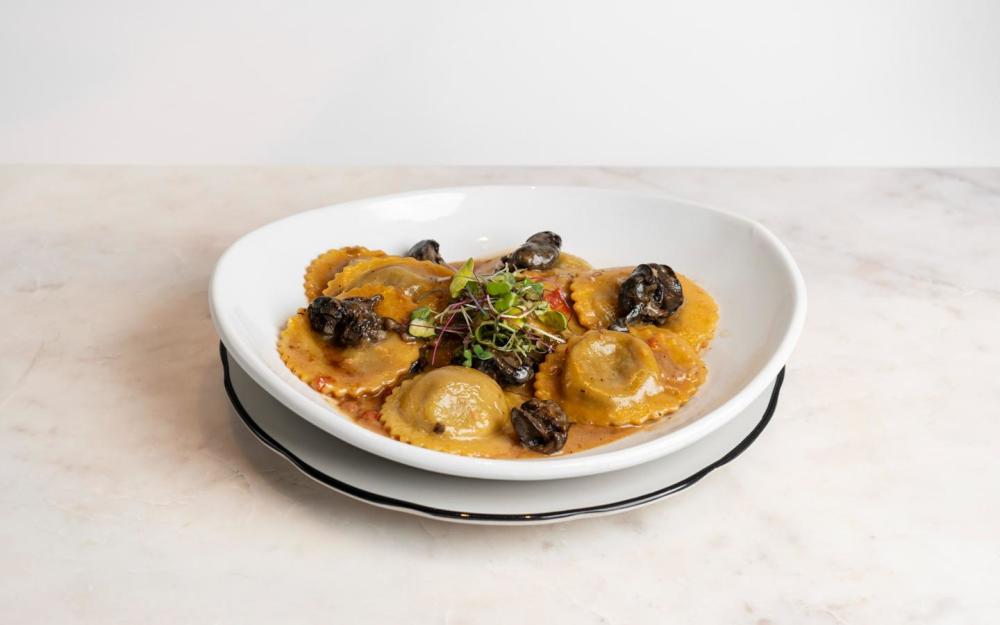 with Escargot and a Creamy Red Wine, Soy & Leek Sauce