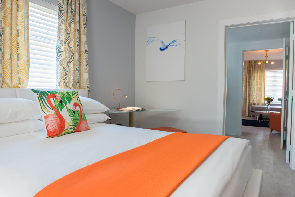 Seaside's fully furnished and accessorized One Bedroom Suite has all the comforts of home. The bedroom features one queen-size bed with ultra-plush, pillow-top mattress, and high-quality Egyptian cotton sheets. The living room showcases a sofa bed and sitting area. Enjoy newly constructed tile floors, full kitchen with a stove top burner, microwave, coffee maker, toaster, cookware, washer and dryer. The apartment offers complimentary WiFi, 42" plasma TV with satellite service, bath amenities, linens and housewares, all utilities, and daily housekeeping. Occupancy is limited to four guests. Located in the heart of Miami Beach, Seaside One Bedroom Suites is an idyllic accommodation for a tropical retreat.