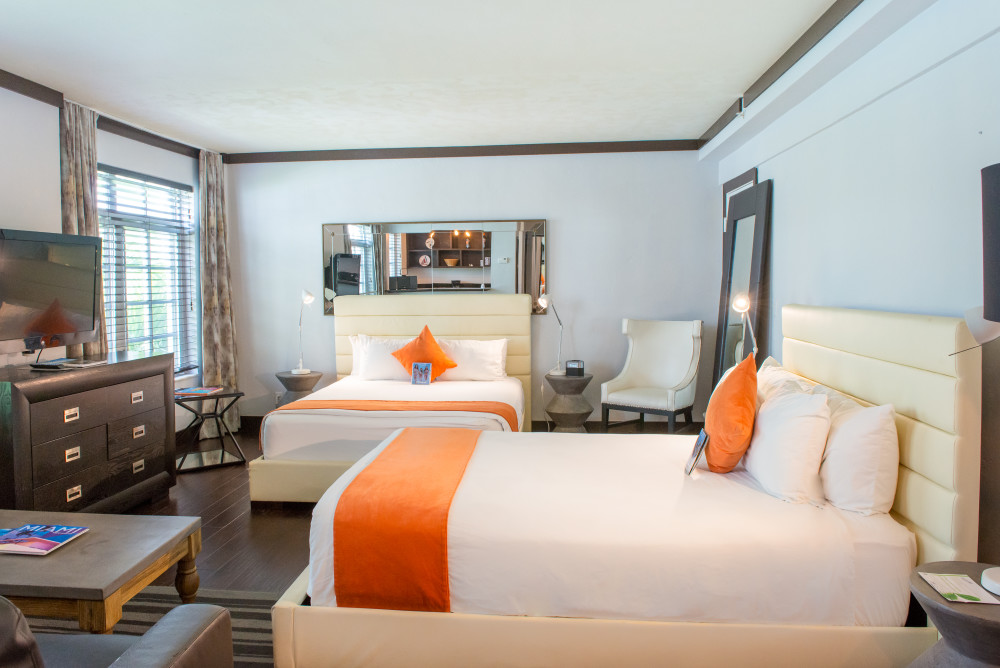 Beautifully styled and accessorized boutique Studio Suite with Two Beds features two queen-size beds, a full kitchen, and a sitting area. Well appointed spacious room includes 42" plasma TVs with satellite service, free WiFi, premium linens, and housewares. The accommodation benefits from a seating area, a dining table, and stylish decor. This fully furnished suite is ideal for a relaxing stay and has all the comforts of a home away from home. You will appreciate the extra space and comfort whether you are combining business and leisure or enjoying a friends getaway to Miami Beach.
