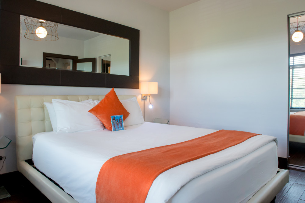Beautifully styled and accessorized boutique Studio Suite with One Bed features a full kitchen and sitting area. The well-appointed spacious suite includes 42" plasma TVs with satellite service, free WiFi, premium linens, and housewares. The accommodation also benefits from a seating area, a dining table, and stylish decor. These fully furnished Studio Suite offers one queen-size bed and is ideal for a relaxing stay with all the comforts of a home away from home. You will appreciate the extra space and comfort whether you are combining business and leisure or enjoying a couples retreat in Miami Beach.