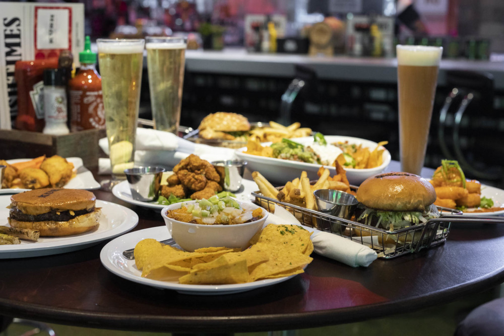 Expect the greatest hits from the Kush Hospitality menu