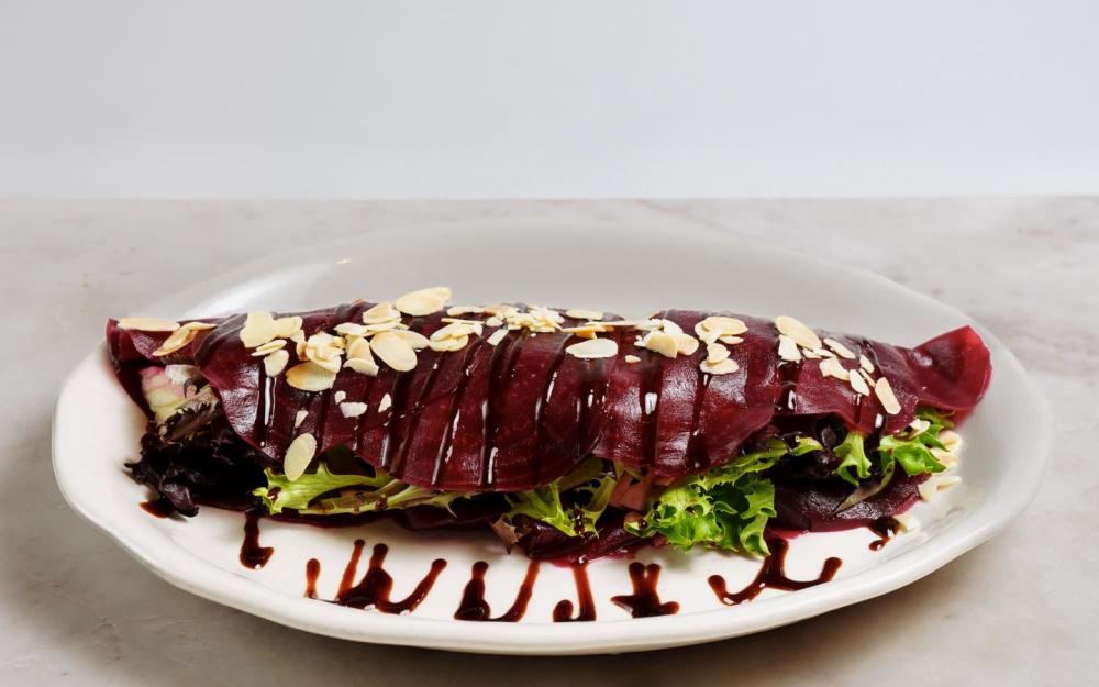 Mixed Greens, Goat cheese, Apples, Roasted almond in a Beet Carpaccio with Balsamic & Olive Oil