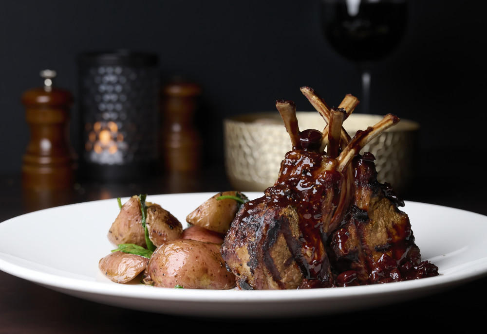 Six flavorful lamb chops grilled to your taste. Served over roasted potatoes tossed with spinach and a Malbec wine reduction with figs.