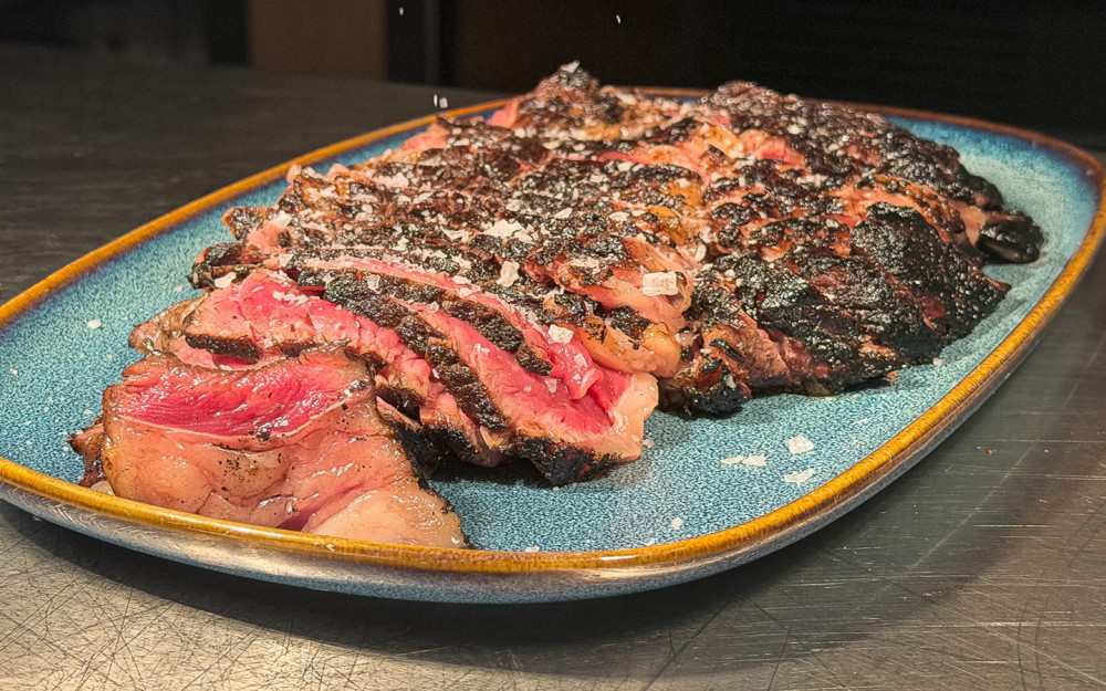 Prime Top Sirloin Cap, Grilled, Accompanied by French Fries.