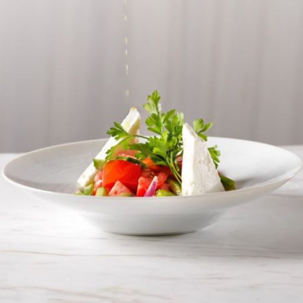 The authentic salad prepared with vine-ripened tomatoes