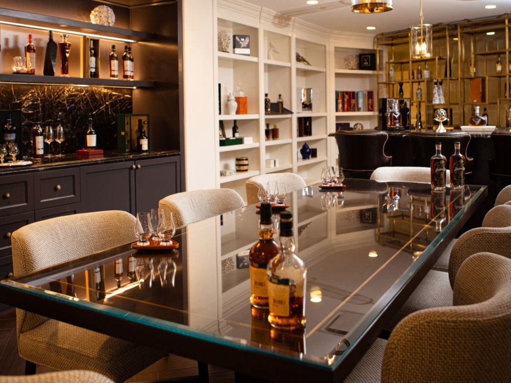 The Experience Salon offers an intimate setting for enjoying fine whiskey and bourbon.