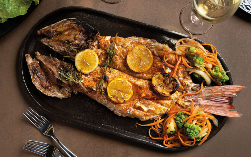 Fresh Fish cooked in a Charcoal Gaucho style grill
