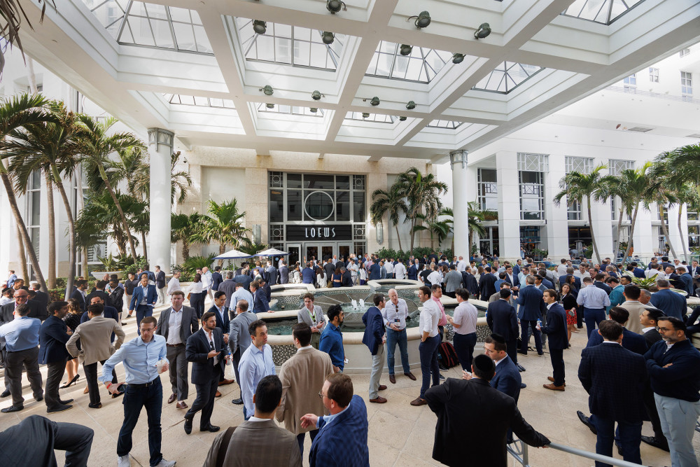 Attendees Networking at The Loews Hotel Miami Beach