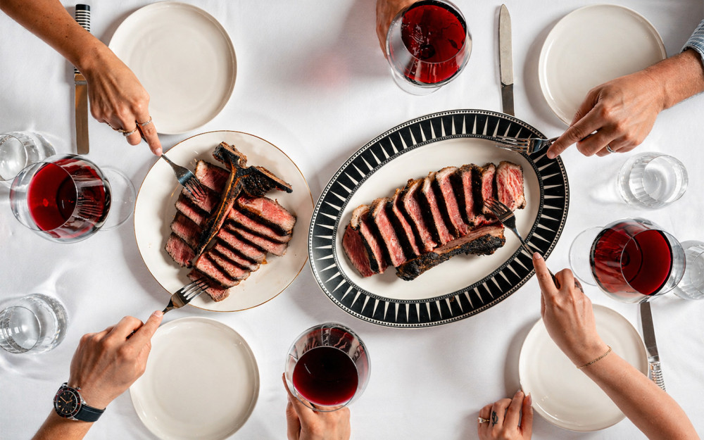 Steak Dinner with wine and friends