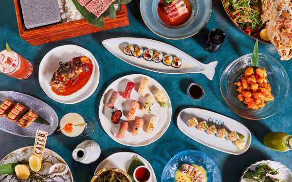 Tablescape of shareable plates at Catch