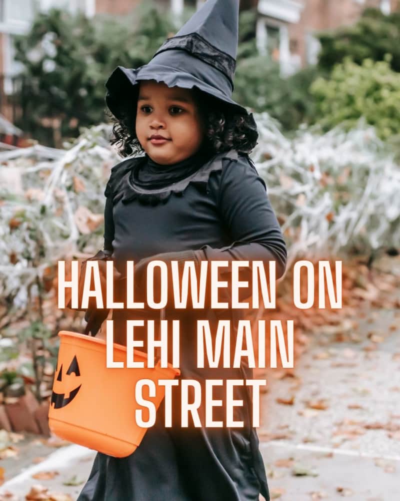 Child in a witch costume holding a pumpkin bucket, with the text Halloween on Lehi Main Street