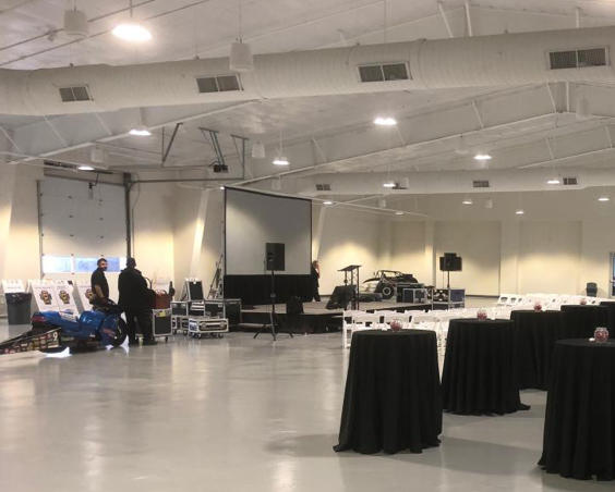 Binford Pavilion at Lucas Oil Indianapolis Raceway Park - Indoor Set Up With Cars