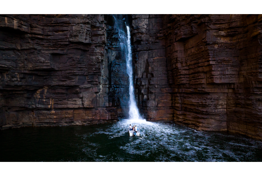 Cruise in close to thundering waterfalls carved into ancient rock.