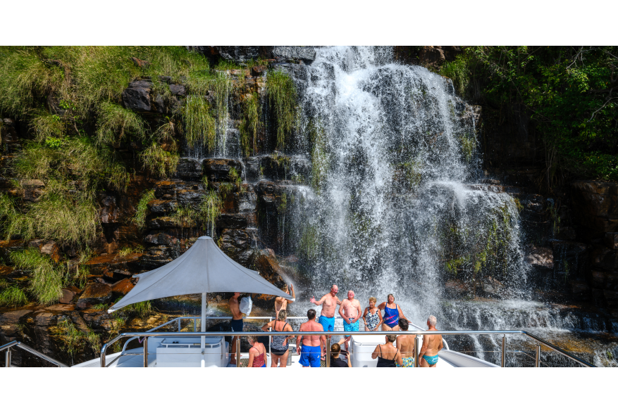 Experience a refreshing waterfall shower right from your Kimberley cruise.