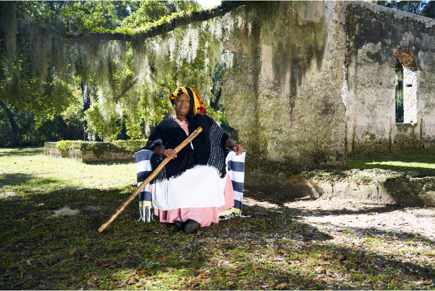 Person wearing traditional Gullah clothes.