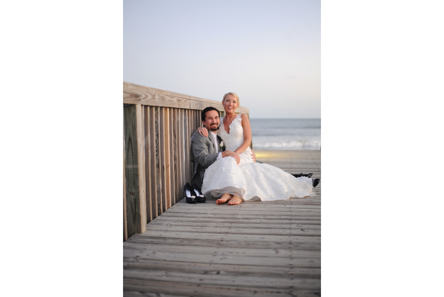 nc-beach-wedding-couple-on-boardwalk