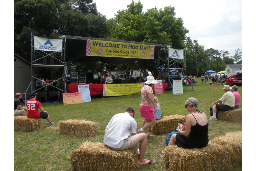 Hog Day attendees Listening to The Wiley Fosters.jpg