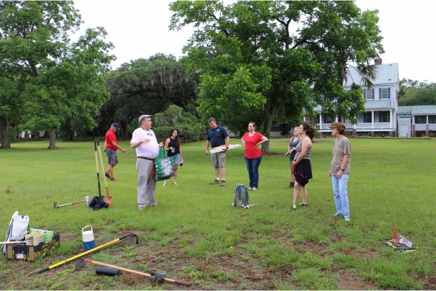 Group gathers before planting