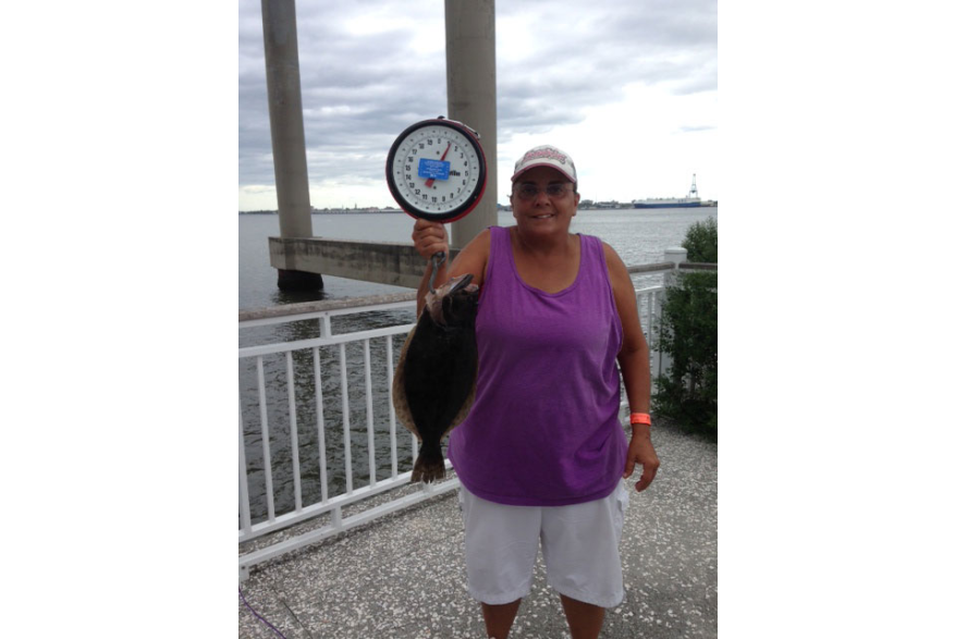 Eileen Urrutia with 2 lb., 9 oz. flounder