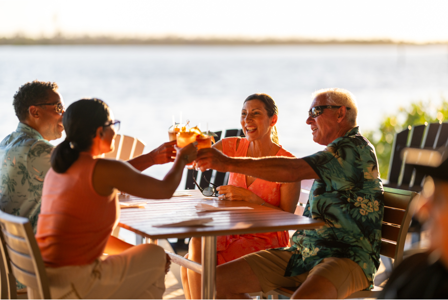 Couples "Cheersing" at Lighthouse Grill & Tiki Bar