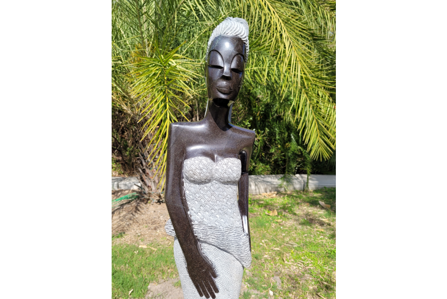 Zimsculpt: Sculpture of a Woman Sitting at Peace River Botanical & Sculpture Gardens