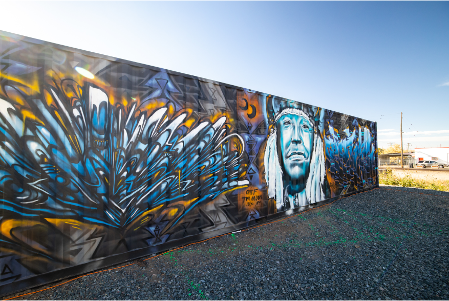 a mural of a native American on a shipping container in Cheyenne