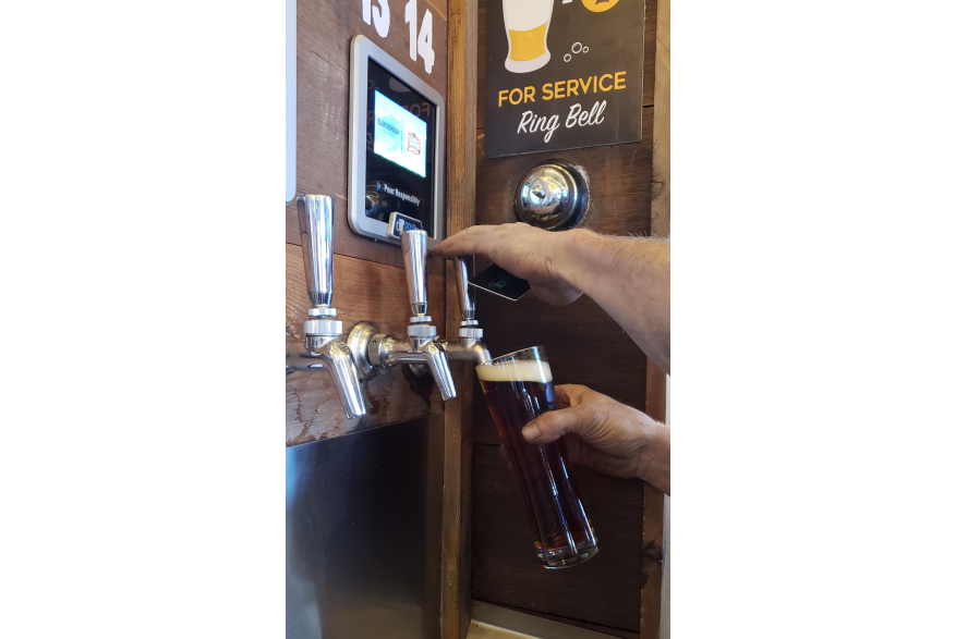 Beer poring from a tap at Accomplice Brewing Company in Cheyenne, Wyoming.
