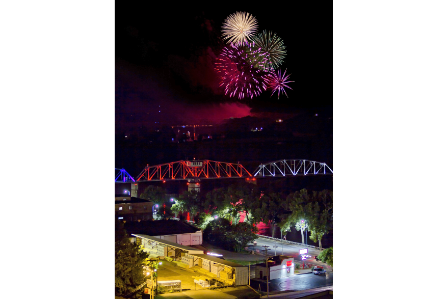 fireworks over a river